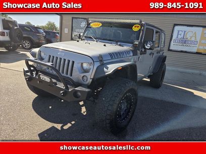 Used 2014 Jeep Wrangler Unlimited Sahara w/ Dual Top Group
