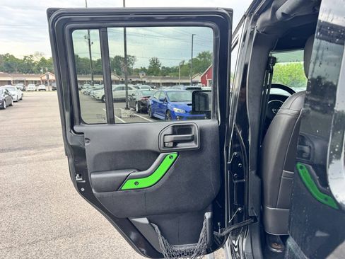 Used 2014 Jeep Wrangler Unlimited Rubicon w/ Dual Top Group AWD/4WD image 17
