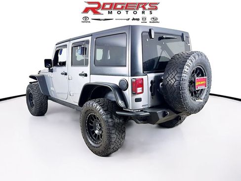 Used 2013 Jeep Wrangler Unlimited Sahara w/ Dual Top Group AWD/4WD image 6