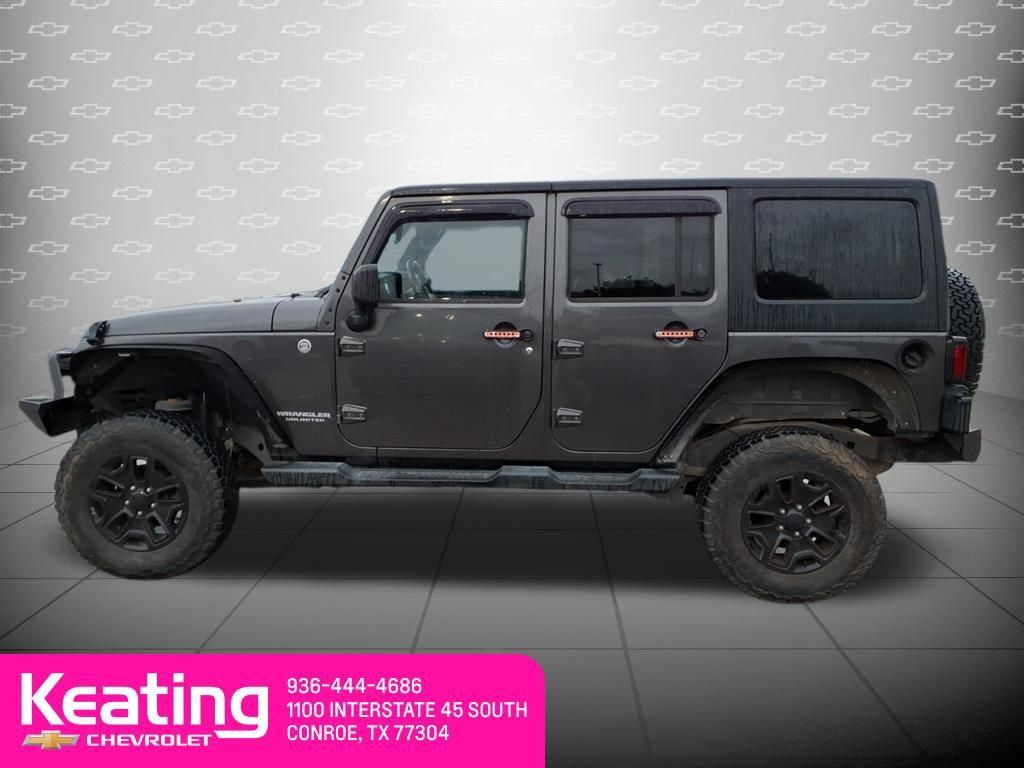 Used 2014 Jeep Wrangler Unlimited Sahara w/ Connectivity Group AWD/4WD image 6