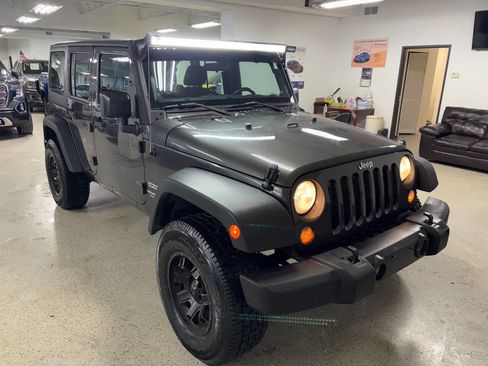 Used 2014 Jeep Wrangler Unlimited Sport w/ Connectivity Group image 1