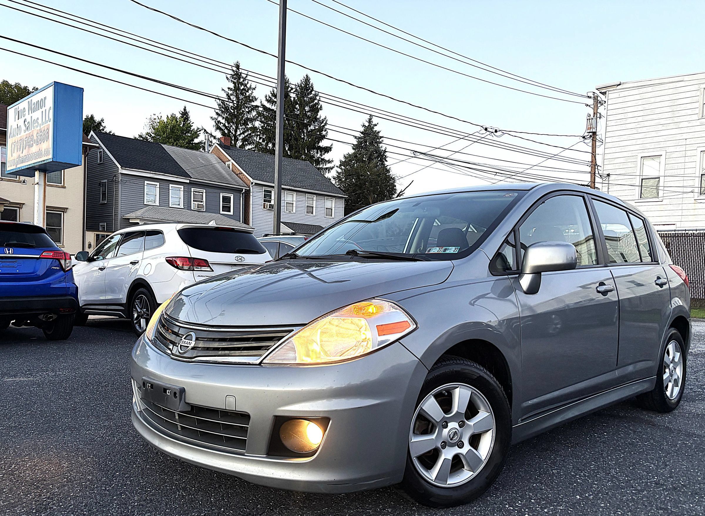 Used 2011 Nissan Versa Hatchback w/ Navigation/Satellite Pkg FWD image 1
