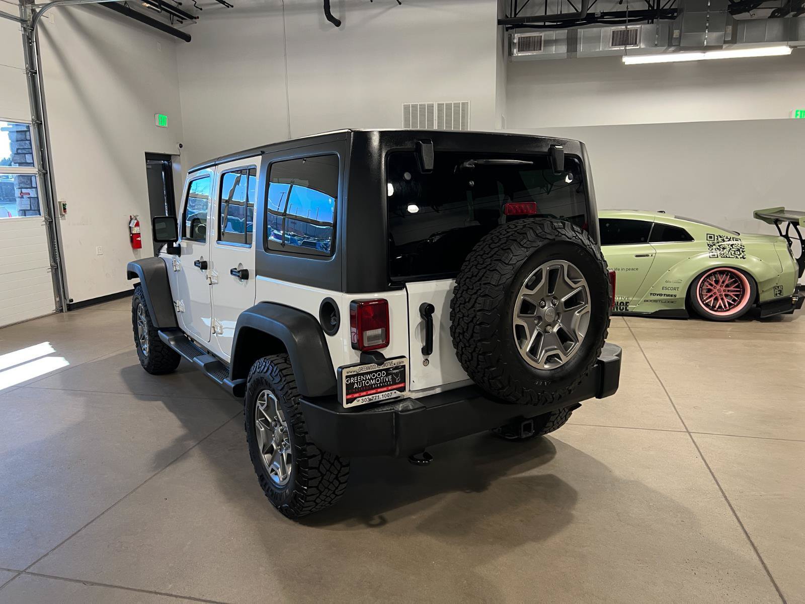 Used 2014 Jeep Wrangler Unlimited Rubicon w/ Dual Top Group AWD/4WD image 5