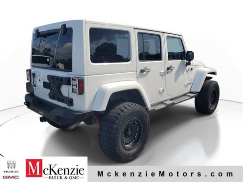 Used 2013 Jeep Wrangler Unlimited Sahara w/ Dual Top Group AWD/4WD image 4