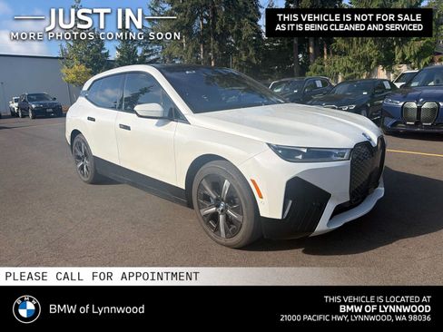 Used 2024 BMW iX xDrive50 w/ Sport Package AWD/4WD image 1