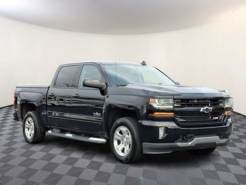 Used 2016 Chevrolet Silverado 1500 LT w/ Texas Edition AWD/4WD image 1