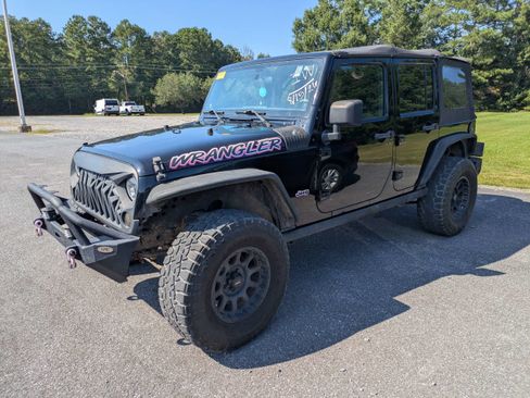 Used 2012 Jeep Wrangler Unlimited Sport w/ Connectivity Group AWD/4WD image 2