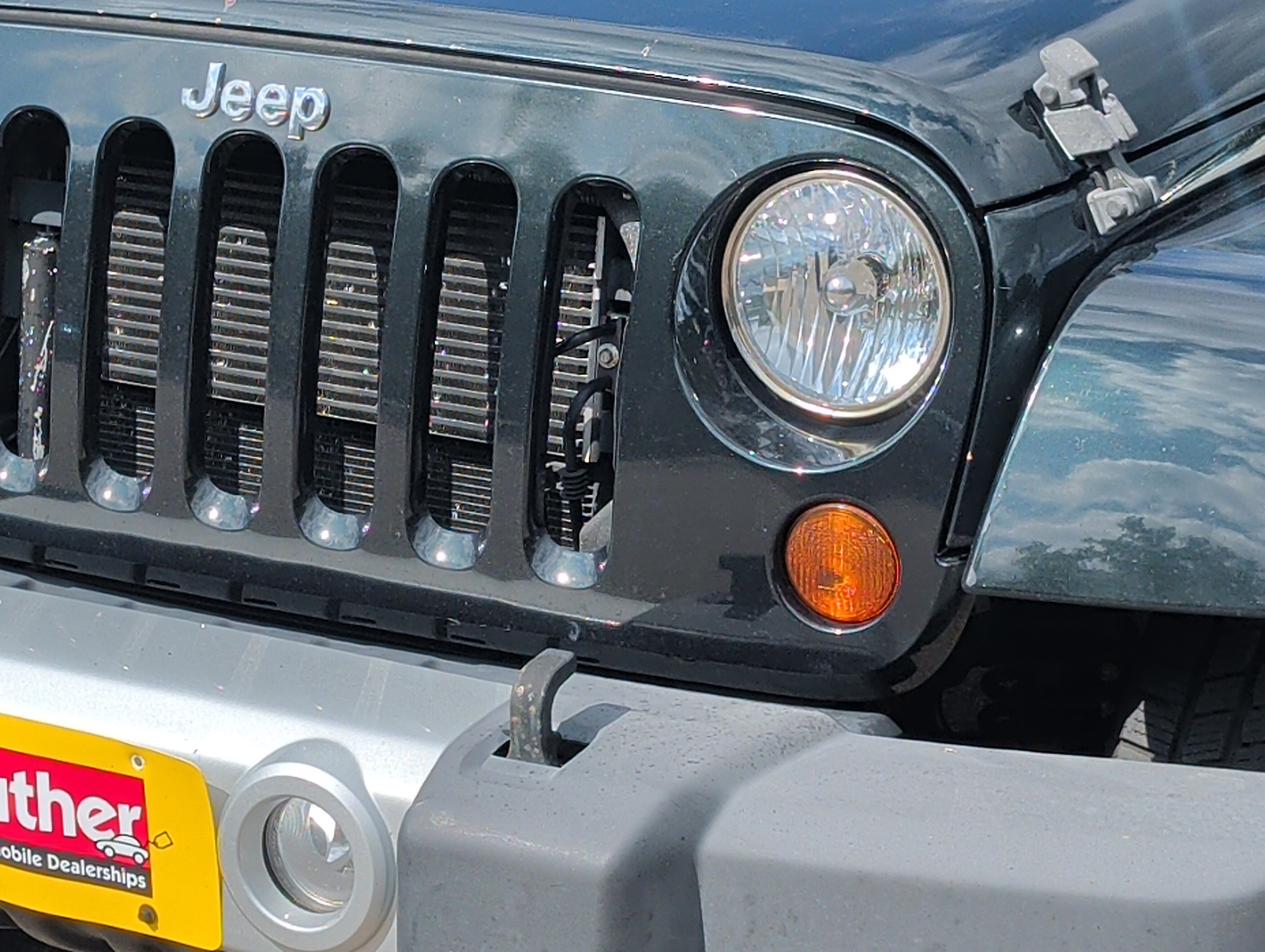 Used 2012 Jeep Wrangler Unlimited Sahara w/ Dual Top Group AWD/4WD image 16