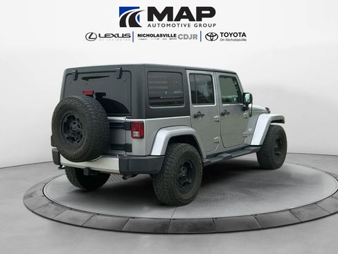 Used 2015 Jeep Wrangler Unlimited Sahara w/ Dual Top Group AWD/4WD image 5
