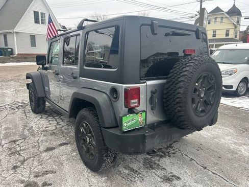 Used 2013 Jeep Wrangler Unlimited Rubicon w/ Dual Top Group image 11