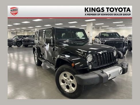 Used 2014 Jeep Wrangler Unlimited Sahara w/ Connectivity Group AWD/4WD image 1