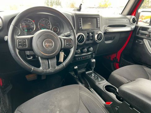 Used 2015 Jeep Wrangler Unlimited Sahara w/ Dual Top Group AWD/4WD image 14