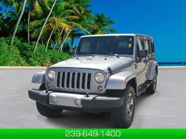 Used 2016 Jeep Wrangler Unlimited Sahara AWD/4WD image 1