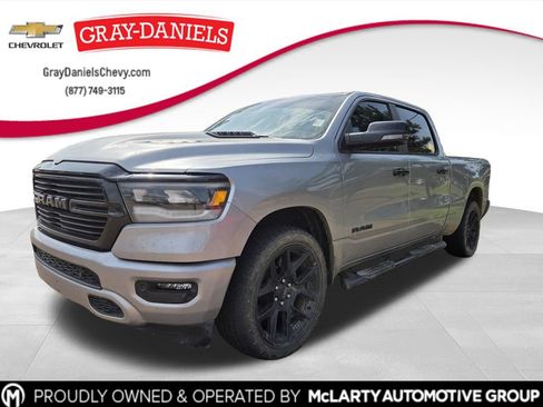 Used 2024 RAM 1500 Laramie AWD/4WD image 1