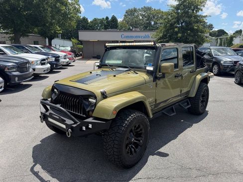 Used 2013 Jeep Wrangler Unlimited Sahara w/ Dual Top Group AWD/4WD image 2