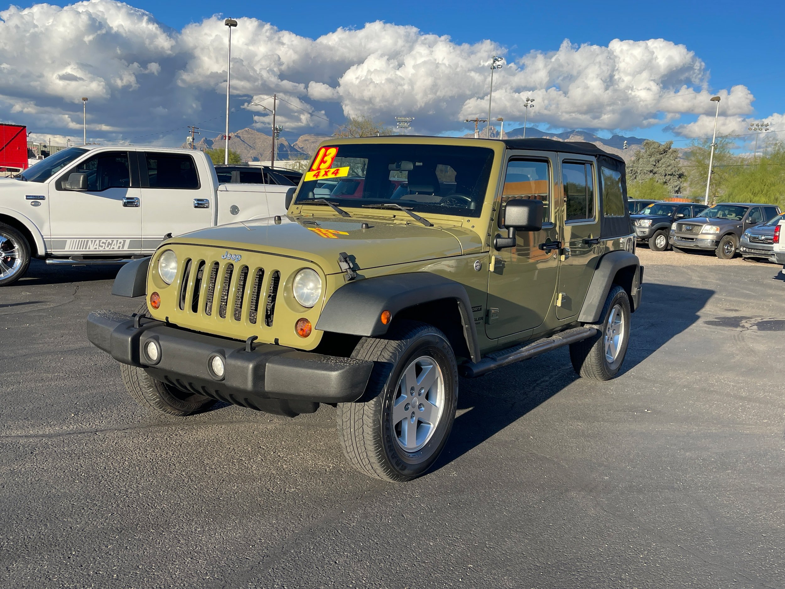Used 2013 Jeep Wrangler Unlimited Sport w/ Mopar Black Appearance Group AWD/4WD image 1