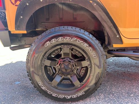 Used 2013 Jeep Wrangler Unlimited Sport w/ Mopar Black Appearance Group image 22