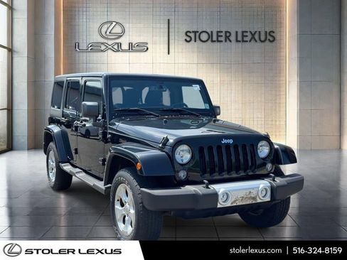 Used 2014 Jeep Wrangler Unlimited Sahara w/ Connectivity Group AWD/4WD image 1