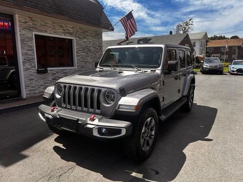 Used 2021 Jeep Wrangler Unlimited Sahara w/ Uconnect 4C Nav & Sound Group AWD/4WD image 1
