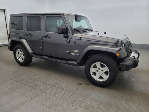 Used 2014 Jeep Wrangler Unlimited Sahara w/ Dual Top Group AWD/4WD image 11