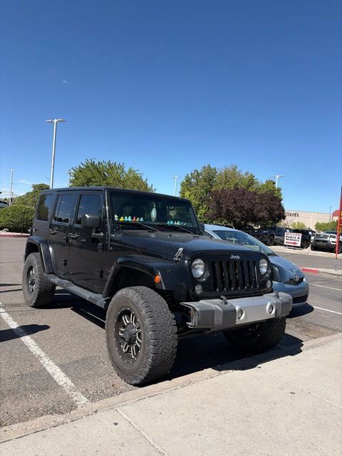 Used 2015 Jeep Wrangler Unlimited Sahara w/ Connectivity Group AWD/4WD image 1