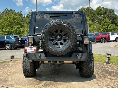 Used 2012 Jeep Wrangler Unlimited Rubicon w/ Dual Top Group AWD/4WD image 6