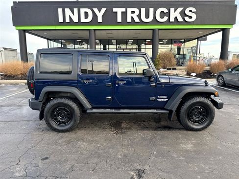 Used 2013 Jeep Wrangler Unlimited Sport image 1