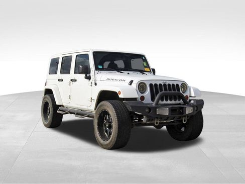 Used 2012 Jeep Wrangler Unlimited Rubicon w/ Dual Top Group image 1