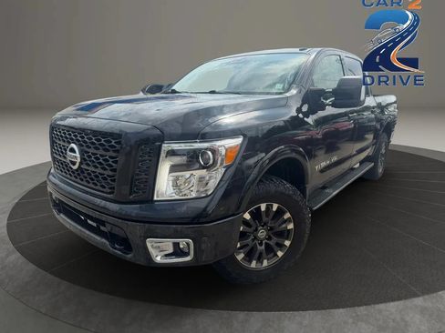 Used 2019 Nissan Titan PRO-4X w/ Pro-4x Utility Package AWD/4WD image 1
