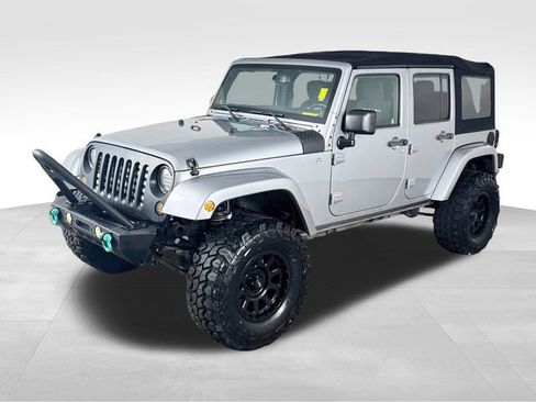 Used 2013 Jeep Wrangler Unlimited Sahara w/ Connectivity Group AWD/4WD image 1