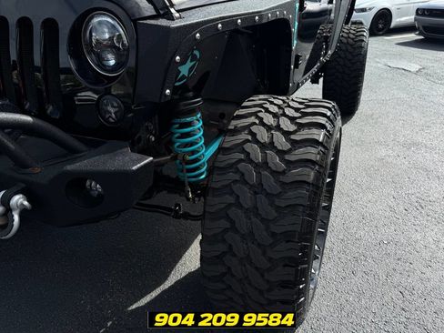 Used 2016 Jeep Wrangler Unlimited Sport w/ Max Tow Package AWD/4WD image 13