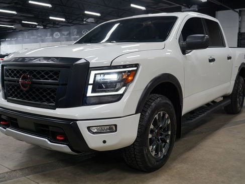 Used 2024 Nissan Titan PRO-4X w/ Pro-4x Utility Package AWD/4WD image 1