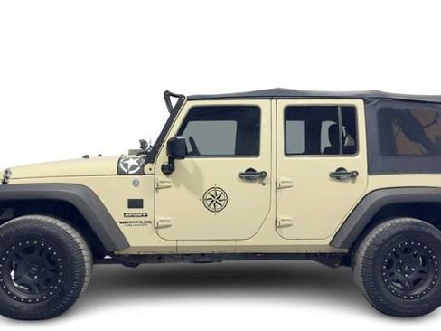 Used 2011 Jeep Wrangler Unlimited Sport image 1