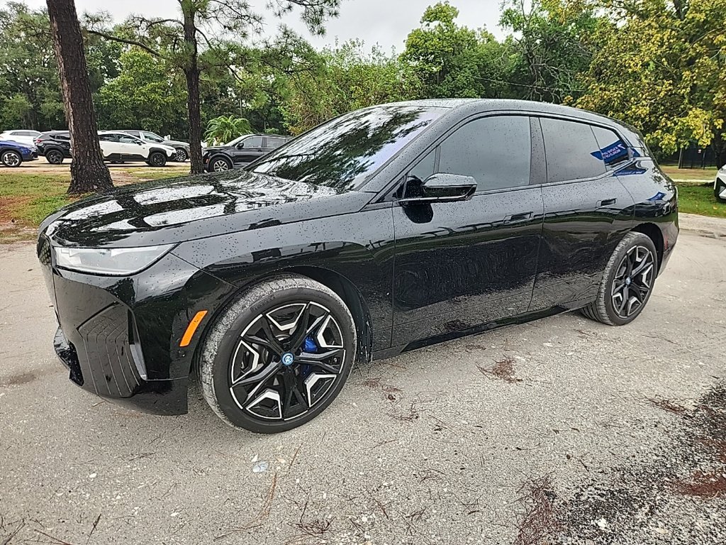 Used 2024 BMW iX xDrive50 w/ Premium Package AWD/4WD image 1