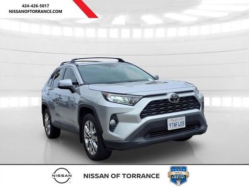 Used 2021 Toyota RAV4 XLE Premium w/ Carpet Mat Package (TMS) FWD image 1