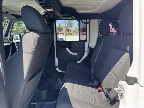 Used 2012 Jeep Wrangler Unlimited Sahara w/ Dual Top Group AWD/4WD image 22
