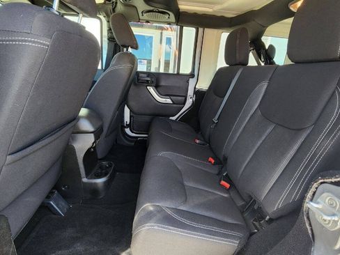 Used 2013 Jeep Wrangler Unlimited Sahara w/ Dual Top Group AWD/4WD image 18