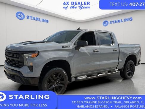Certified 2025 Chevrolet Silverado 1500 Custom Trail Boss w/ Turbomax Blackout Package AWD/4WD image 1