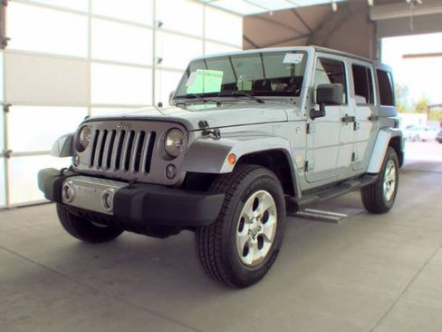 Used 2014 Jeep Wrangler Unlimited Sahara w/ Connectivity Group AWD/4WD image 1