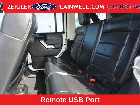 Used 2012 Jeep Wrangler Unlimited Sahara w/ Dual Top Group AWD/4WD image 11