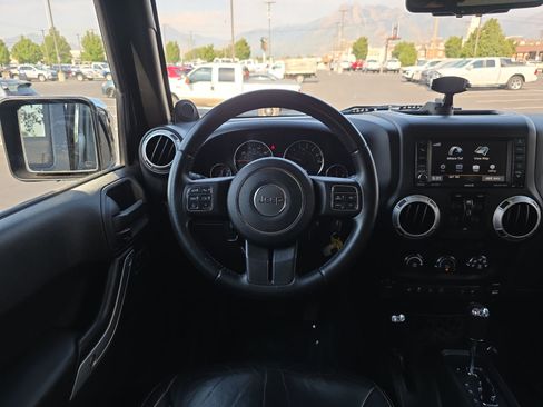 Used 2014 Jeep Wrangler Unlimited Sahara w/ Dual Top Group AWD/4WD image 12