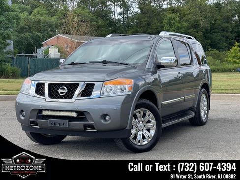 Used 2015 Nissan Armada Platinum w/ 2nd Row Captain Seat Package AWD/4WD image 1