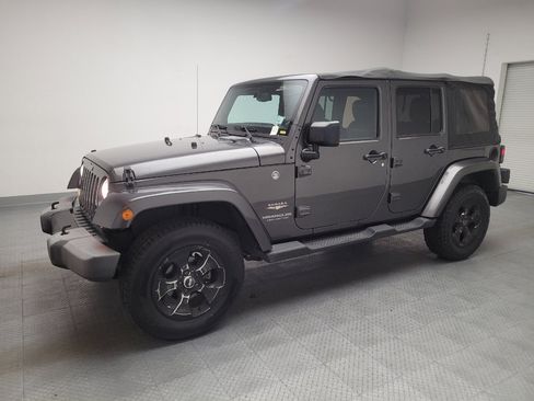 Used 2014 Jeep Wrangler Unlimited Sahara w/ Connectivity Group AWD/4WD image 2