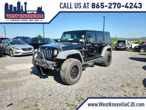 Used 2010 Jeep Wrangler Unlimited Sport AWD/4WD image 1