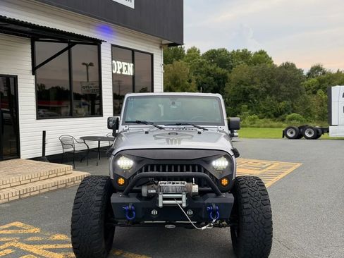 Used 2013 Jeep Wrangler Unlimited Sport AWD/4WD image 2