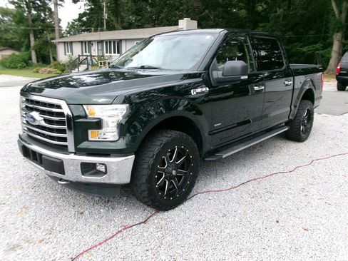 Used 2015 Ford F150 XLT w/ Equipment Group 302A Luxury AWD/4WD image 1