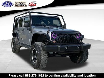Used 2014 Jeep Wrangler Unlimited Sahara