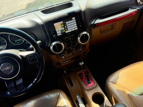 Used 2013 Jeep Wrangler Unlimited Sahara w/ Mopar Chrome Edition Group AWD/4WD image 19