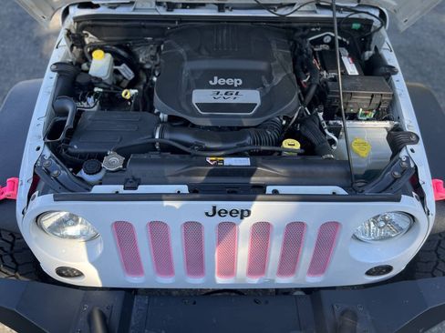 Used 2012 Jeep Wrangler Unlimited Sport AWD/4WD image 23