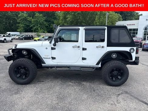 Used 2013 Jeep Wrangler Unlimited Sahara w/ Dual Top Group AWD/4WD image 2